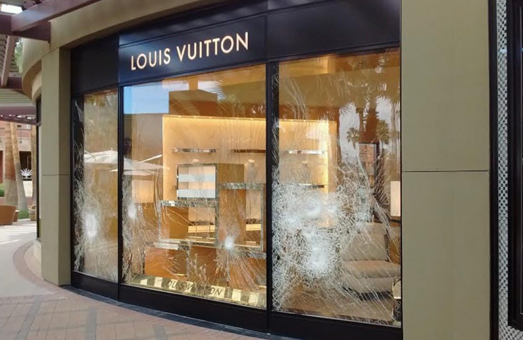 louis vuitton damaged glass storefront