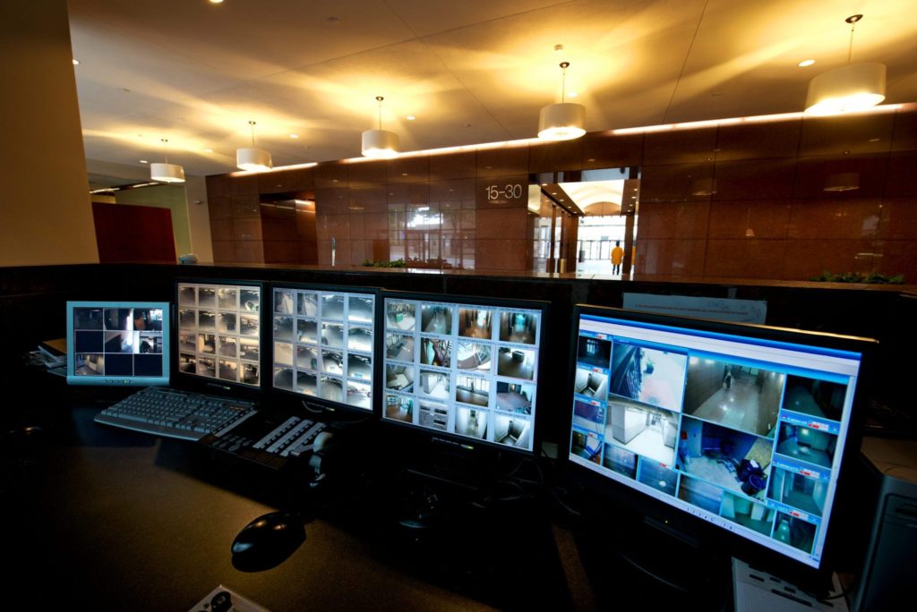 security room with views of all cameras on computers