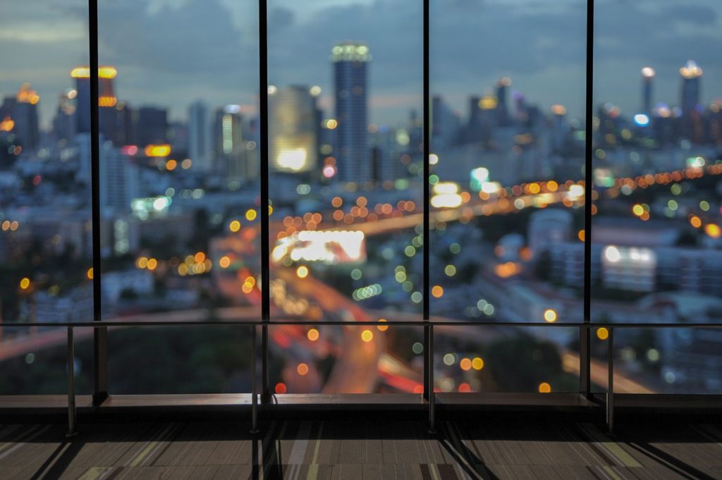 view of evening cityscape out the windows