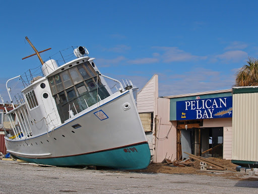 ship on shore after hurricane