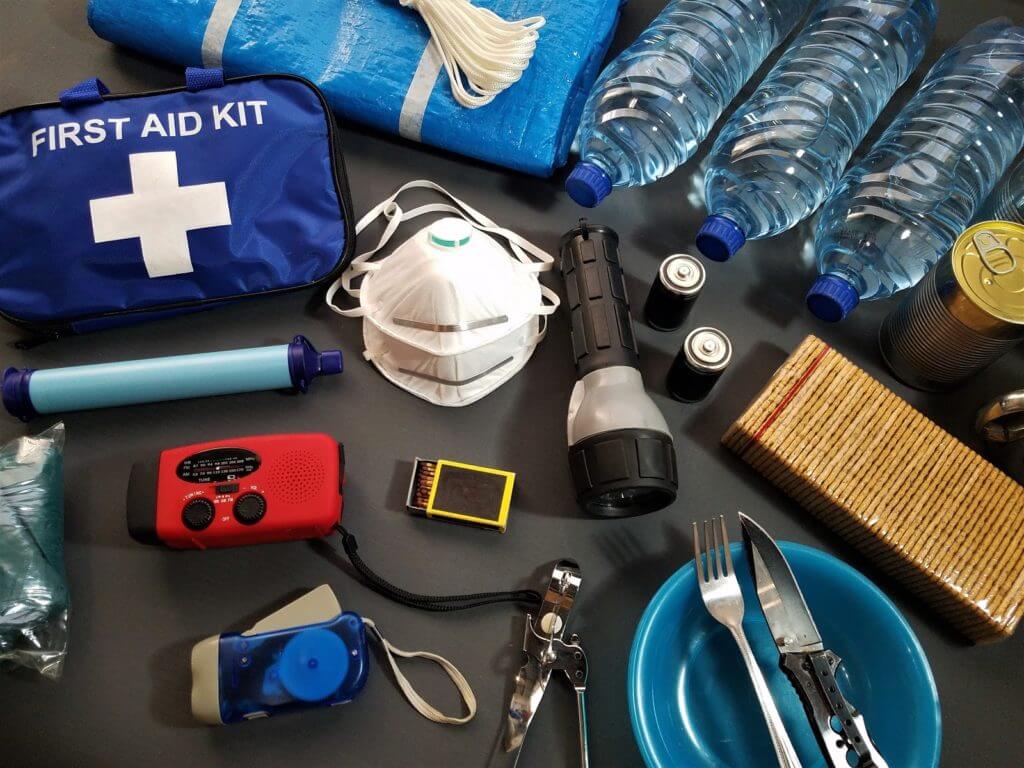 emergency preparedness materials laid out on ground