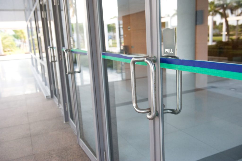 wall of glass doors with pull handles